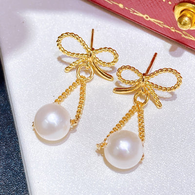 Butterfly long design natural pearl earrings